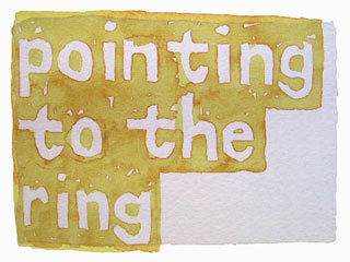 pointing to the ring