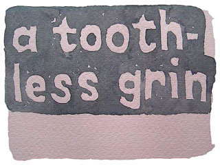 a toothless grin