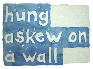 hung askew on a wall